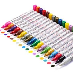 many different colored markers are lined up together