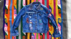 "Vintage denim jacket // One of a kind handstitched patchwork boho jean trucker jacket // Izod Jeans petites // Women's Size XS Petite; Measurements: 24\" Sleeve, 40\" Chest, Shoulder to shoulder 17\",  22\" Length Shoulder to hem Fabric: 100% Cotton All Sales Final." Hippie Cotton Patchwork Denim Jacket, Hippie Patchwork Cotton Denim Jacket, Hippie Fitted Denim Jacket, Hippie Patchwork Denim Jacket For Spring, Spring Hippie Patchwork Denim Jacket, Bohemian Cotton Denim Jacket With Patches, Bohemian Denim Jacket With Patches, Bohemian Patchwork Denim Jacket For Fall, Hippie Patchwork Denim Jacket For Fall