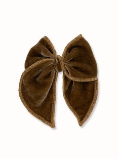 The perfect accessory for everyday or party looks. A versatile and classic piece. Luxurious Silk Royal Velvet fabric in bronze gold color. Silver-tone alligator clip. The bow measures approximately 4.5 x 5.0 inches * Due to the nature of our handmade bows each bow may look slightly different. * This hair accessory is not a toy, we recommend not to play with it. It may contain small parts that potentially could be dangerous to small children, please supervise your child while wearing our hair acc Be Dangerous, Fallen Book, Book Launch, Brown Silk, Bronze Gold, Large Bow, Handmade Bows, Party Looks, Hair Accessory