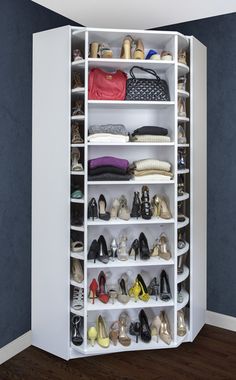 a white closet filled with lots of shoes