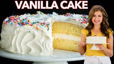 a woman holding a piece of cake in front of a white cake with sprinkles