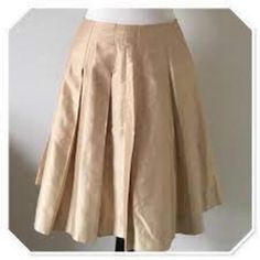 Banana Republic 100% Silk Shantung Soft Pleated Midi Skater Skirt New With Tags Fully Lined Pleated Details Hidden Side Zipper Color: Soft Champagne Gold Mint Condition Smoke Free Pet Free Home Msrp $198.00 Questions? Leave A Comment Below! Classic Full Mini Skirt For Spring, Beige Pleated Skirt For Spring Formal, Beige Pleated Skirt For Spring Formal Occasions, Spring Formal Beige Pleated Skirt, Formal Beige Pleated Skirt For Spring, Cream Pleated Skirt For Work, Classic Beige A-line Skirt, Formal Full Beige Skirt, Beige Fitted Knee-length Pleated Skirt