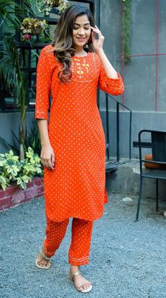 Original bandhni (kutch-bhuj) Pant-Kurti Set Kurti- rayon bandhani kurti with gotta and hand work  Pant- rayon bandhni pant with gotta lace Quality: 100 % Guaranteed Stitched: Yes Full Stitched Sleeve length: 3/4 sleeve Pockets: No Leg/hem length: Mid-calf Neckline: Boat Kurta style: Straight Fabric technique:  Embroidered Wash Care: Machine Wash & Hand Wash In Cold Water Using Mild Detergent. Shipping - We use globally known Logistics for best services like Fed-Ex, DHL, India Post. It usually takes around 7 - 15 day to deliver in Standard Delivery OR 3 - 7 Day in Express. Return - We gladly accept return in light of Etsy Guidelines. Please contact us before raising a Return Request, we may be more useful in resolving your issues. Thank you so much for visiting. Have a great day ahead! Unstitched Orange Traditional Wear With Bandhani Print, Unstitched Orange Bandhani Traditional Wear, Orange Anarkali With Bandhani Print, Fitted Cotton Palazzo Set With Dabka Work, Orange Bandhani Print Traditional Wear For Eid, Fitted Churidar With Printed Motifs For Navratri, Fitted Pant Set With Zari Work For Diwali, Fitted Cotton Salwar Kameez For Puja, Fitted Pant Set With Straight Kurta And Printed Motifs