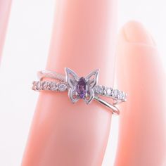 "White gold amethyst ring, Butterfly ring, 14k gold ring for her, Promise ring gold, Promise ring for her, Dainty ring gold,Marquise cut ring WE OFFER UNLIMITED PERIOD INSTALLMENTS PLAN This is a beautiful, stunning, feminine ring that works well for all occasions, styles, and ages. You will love it! Ring information: Main stone: Amethyst Approximate size: 4*2mm Accent stone: Cubic zirconia Metal type: Gold Metal stamp: 14k Gold Customization / Replacements It's easy to create jewelry that's per Vvs Clarity Amethyst Ring, Purple Diamond Ring With Vvs Clarity, Fine Jewelry Amethyst Ring With Vs Clarity, Fine Jewelry Amethyst Ring With Open Design, Amethyst Open Ring Fine Jewelry, Hallmarked Butterfly Ring For Promise, Dainty Purple Promise Ring, Purple Hallmarked Fine Jewelry Rings, Purple Dainty Promise Ring