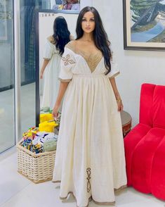 Discover the timeless elegance of Ethiopian culture with this beautiful Habesha dress, also known as the Habesha Kemis. This Ethiopian traditional dress features a very simple design in light colors, highlighting the understated beauty and classic craftsmanship of Ethiopian attire. Material Cotton Thread Estimated delivery : 1 week to 2 weeks Contact WhatsApp +1(304)-306-2784Email: contact@ethiopian.store Ethiopian Gold Jewelry, Simple Habesha Kemis, Ethiopian Cultural Clothes, Habesha Kemis Ethiopian Dress, Habesha Clothes, Ethiopian Dresses, Ethiopian Fashion, Ethiopian Culture, Ethiopian Clothing