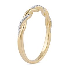 An elegant classic, this diamond twist band in yellow gold is a must-have look for your collection of stackable rings. Created in warm 10K gold Polished and diamond-lined ribbons shimmer in a timeless twist design. This band shines with 1/10 ct. t.w. of diamonds. Modern Twist Yellow Gold Diamond Ring For Formal Occasions, Modern Twist Yellow Gold Diamond Ring, Modern Twist Diamond Stackable Rings For Anniversary, Elegant Twisted Stackable Promise Rings, Gold Diamond Ring For Anniversary With Modern Twist, Modern Twist Gold Diamond Ring For Anniversary, Modern Twist Yellow Gold Diamond Ring For Anniversary, Anniversary Yellow Gold Diamond Ring With A Modern Twist, Anniversary Modern Twist Yellow Gold Diamond Ring