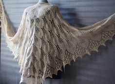 "Triangle shawl shoulder cape versatile accessory, perfect for adding a touch of charm to the winter wedding or any other occasion. Shawl hand knit from soft and cozy merino wool lace can be a great anniversary gift, gift for wife, or Mother Day gift. This wedding shawl bride ready to ship in sage green, emerald green, beige and teal blue colours, other colours (black, brown) available! * Leaf shawl has  length is about 39,3\"(100cm ) and width 86.6\" (220cm)  Wool wrap be worn draped over your shoulders or wrapped around your neck like a large triangle scarf, this beige shawl indispensable accessory for the cottagecore outfits *Care instructions-hand wash in warm water, lay flat to dry" Handmade One Size Shawl For Weddings, Elegant Hand Knitted Cream Shawl, Handmade One-size Shawl For Wedding, Handmade Cream Shawl One Size, Handmade One-size Wedding Shawl, Beige Hand Knitted Shawl One Size, Cream Knitted Shawl One Size, One Size Cream Knitted Shawl, Cream Knitted One Size Shawl