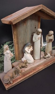 a nativity scene with figurines in the shape of a mangerau