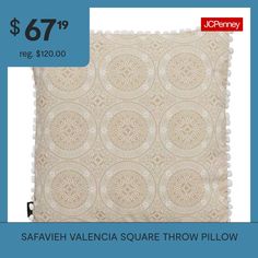 a white square pillow with an image of a flower pattern on it and the price is $