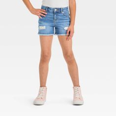 These Cut-Off Jean Shorts from Cat & Jack™ feature a frayed finish on the hem for a cool touch of laid-back style. Made from stretchy denim fabric, these regular-fit shorts offer easy movement and all-day comfy wear. The belt loops and a front fly snap and zipper closure provide a secure fit, while the classic five-pocket design adds functional style. Your child can pair them with a variety of different tops for tons of stylish warm-weather looks. Cat & Jack™: Kids’ clothing with an imagination Functional Style, Comfy Wear, Cut Off Jeans, Laid Back Style, Bottom Clothes, Denim Fabric, Pocket Design, Girls Shopping, Medium Blue