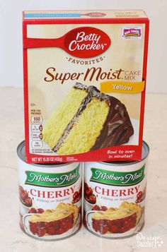 two cans of betty crocker's super moist cake mix next to each other