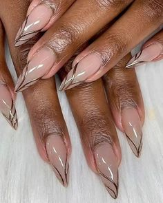 Discover 20 stunning fall nail colors perfect for dark skin tones, featuring the best trends and ideas for 2024. From rich burgundies to elegant nudes, these nail colors are designed to complement and enhance the natural beauty of darker skin tones. Explore a variety of styles, including classic French tips, glamorous gold embellishments, and bold matte finishes. Tips Of Nails Painted, Fall Nail Designs Short Almond Shape, Burgundy And Red Nails, Pretty Fall Nail Designs, 2024 Nail Trends Fall, Fall Almond Nails Ideas Short, Soft Fall Nails, Nails Acrylic Nude Color, Almond Nail Color Ideas