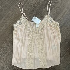 Light Beige Camisole Top With Lace. New With Tags. Beige Camisole Tank Top For Daywear, Chic Lace Top With Delicate Straps For Spring, Spring Cami Lace Top, Chic Lace Cami Top For Spring, Chic Spring Lace Cami Top, Beige Camisole Top For Daywear, Chic Lace Top Camisole For Spring, Spring Beige Tank Camisole, H&m Tank Top For Spring