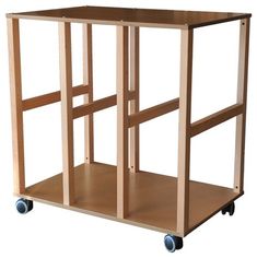 a wooden cart with three shelves on wheels