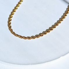 Get on trend in the stunning shiny rope chain! Wear it alone as a statement or layer it with your favorite necklaces. ✔Hypoallergenic ✔Water Resistant ✔Quality Guaranteed ✔Handmade ✔ Lifetime Warranty Against Rust And Tarnishing CHAIN WIDTH: 4MM MATERIAL: stainless steel dipped in real 18k gold COLOR: gold Gift Twisted Rope Chain Necklace, Twisted Chain Necklace For Gifts, Trendy Rope Chain Necklace As Gift, Trendy Rope Chain Necklace For Gift, Everyday Minimalist Rope Chain Necklace, Gold Rope Chains, Rope Chain Necklace, Mens Chain Necklace, Mens Gold