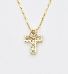 Real Diamond Cross Necklace set with Natural Diamonds, size 2 millimeters each, 0.18 Carats combined.Solid 14k Yellow Gold ☞ made to last.Click here for ☞ Solid Gold Collection**This is a Solid Gold pendant which comes with complimentary '18k Gold Vermeil' chain. For Solid Gold chains, please contact us.Diamond Details:• CERTIFIED Diamond• Weight: 0.18 Carats combined• Dimensions: 2mm each• Cut: RoundSolid Gold Details:• 0.7 grams of 14k Solid Yellow Gold• Dimensions: Length 12.5mm, Width 10mm• Lasts a lifetime - Perfect for everyday use (won’t tarnish)!*Final weight & dimensions depending on the chosen necklaceSKU HC-464 14k Gold Cross Jewelry With 17 Jewels, Yellow Gold Cross Pendant Fine Jewelry, 14k White Gold Cross Pendant Jewelry, Fine 14k Gold Cross Jewelry, 14k Gold Cross Jewelry With Diamond Accents, Fine Jewelry 14k Stamped Cross, Yellow Gold Cubic Zirconia Cross Jewelry, 14k Gold Diamond-cut Cross Pendant, 14k Gold Cross Pendant With Diamond Cut