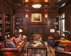 a living room filled with lots of furniture and a fire place in the middle of it