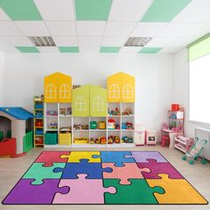 a child's playroom with colorful puzzle pieces on the floor