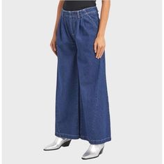 Nwt We The Free People Equinox Denim Trousers Jeans Wide Leg Ritual Blue Size 28 Shipping ( In 1 Business Day.) Measurements Taken Flat And Approximately In Inches: - Waist: 16 In - Rise: 13 In - Inseam: 32 In - Wide Leg: 17 In - Length: 44 In 100% Cotton The Wide-Leg Style Creates A Relaxed Fit That Is Perfect For Any Season, While The Pleated Accents Add A Touch Of Uniqueness To The Design. 32-Inch Inseam And High-Rise Waist. Crafted From 100% Cotton, These Jeans Are Both Durable And Comfortab High-rise Blue Denim Wide Leg Pants, Denim Blue Mid-rise Relaxed Fit Wide Leg Pants, Denim Blue Pull-on Wide Leg Bottoms, Relaxed Fit Wide Leg Pre-washed Jeans, Wide-leg Rigid Denim Pants In Denim Blue, Free People Jeans, Walker Boots, Denim Trousers, Fit N Flare Dress