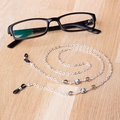 Modern glasses chain - Dalmatian jasper gemstone and grey bead eyewear chain A simple combination of dalmatian jasper gemstones with grey faceted glass beads feature in a silver tone oval link chain. Perfect for everyday wear and keeping your glasses or sunglasses handy. Finished with spectacle ends to hold your glasses. Approximately 26 inches long. Handmade in the UK, in stock and ready to ship. More glasses chains available in my store here - https://www.etsy.com/shop/inspira?section_id=20362 Adjustable Silver Metal Glasses Chains, Minimalist Adjustable Glasses Chains, Minimalist Adjustable Glasses Chains For Everyday, Everyday Minimalist Adjustable Glasses Chains, Silver Glasses Chains With Lobster Clasp And Round Beads, Metal Glasses Chain With Adjustable Chain As Gift, Handmade Silver Metal Glasses Chains, Everyday Silver Glass Jewelry, Everyday Beaded Glass Glasses Chains