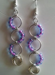 captured eternity earrings instructions - Google Search Unique Diy Earrings Ideas, Beaded Chainmaille, Easy Jewelry Making Ideas, Easy Earrings, Wave Earrings, Chainmaille Jewelry, Chainmail Jewelry, Chain Maille Jewelry