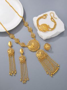 1 piece gold Europe and the United States gorgeous jewelry set wedding decoration necklace earrings bracelet ring set ladies Gold    Copper,Zinc Alloy     Women Fashion Jewelry, size features are:Bust: ,Length: ,Sleeve Length: 21k Gold Jewelry, Traditional Bridal Jewelry, Bracelet Ring, Women's Jewelry Sets, Fashion Jewelry Sets, African Beads, Watches Women Fashion, Gorgeous Jewelry, Wedding Jewelry Sets