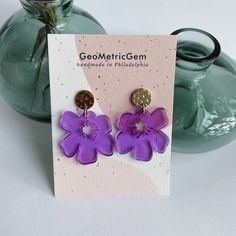 "Ava Earrings. Color: Purple ( other colors are listed separately). Statement yet lightweight earrings. Made from a durable acrylic, gold plated brass and surgical steel posts ( safe for sensitive ears). Approx. measurements. 1.7\"L x 1.2\"W. Handmade in Philadelphia." Trendy Purple Flower Earrings For Gift, Flower Shaped Plastic Jewelry As Gift, Flower-shaped Plastic Jewelry As Gift, Flower-shaped Plastic Jewelry Gift, Plastic Flower-shaped Jewelry For Gifts, Plastic Flower-shaped Jewelry As A Gift, Gold Plastic Earrings For Gifts, Floral Flower Design, Purple Acrylic