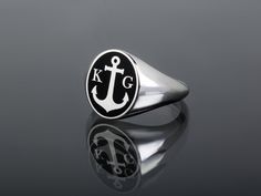 Anchor Silver Ring with two letters of your choice on each side of anchor. (leave note on checkout) ✪ Classic Elegant design for men appearance with black enamel filling at face. ☛ Ring size as preferred, as it is custom created for you in our workshop. (select your ideal one in drop down menu) ☛ Custom design inside ring with your own personalized logo / pattern / symbol is possible. Contact us now! ❏ Material: ✪ Ring made of Sterling Silver 925 ✪ Black Enamel + Additional styles: ✪ Red Enamel Oval Signet Ring, 22k Gold Ring, Custom Signet Ring, Sterling Silver Cleaner, Face Ring, Man Ring, Ring Man, Lapis Lazuli Ring, Real Jewelry