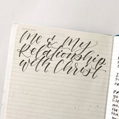 an open notebook with some writing on it