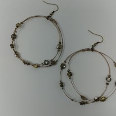 Nwt Tesori Bronze Whisper Wire Earrings Accented With Clear Gem Stones Elegant Metal Hoop Beaded Earrings, Elegant Metal Beaded Hoop Earrings, Nickel-free Metal Hoop Beaded Earrings, Nickel-free Metal Linear Earrings, Nickel-free Round Metal Linear Earrings, Adjustable Metal Hoop Wrap Earrings, Elegant Nickel-free Hoop Beaded Earrings, Elegant Nickel Free Hoop Beaded Earrings, Elegant Nickel-free Beaded Hoop Earrings