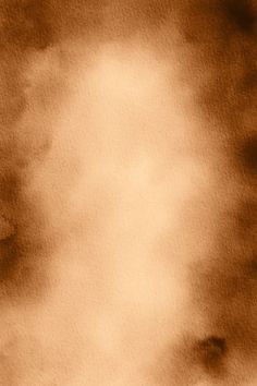 an image of the sky with clouds in sepia and brown tones to it's edges