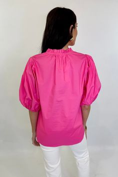 The Anna Top is the perfect blend of style and comfort. With its playful contrast piping v-neck and trendy puff sleeves, you'll turn heads wherever you go. The elastic detailing ensures a flattering fit, making this top a must-have addition to your wardrobe! One size fits a 4-12 best. Model is 5'9 and wears a size small. Trendy V-neck Blouse With Gathered Sleeves, Stretch Puff Sleeve V-neck Top For Spring, Stretch V-neck Puff Sleeve Top For Spring, Chic Stretch Puff Sleeve Top With V-neck, Pink V-neck Puff Sleeve Top, Spring V-neck Stretch Puff Sleeve Top, Pink Cotton Top With 3/4 Sleeves, Chic Stretch V-neck Puff Sleeve Top, Contrast Piping