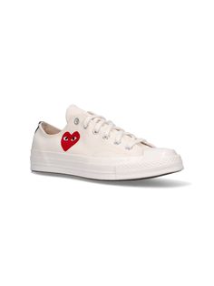 Comme des Garçons Play Converse Chuck 70 low sneakers in white cotton with round toe with rubber detail, laces, red heart print on the side, and rubber sole. composition: 100% cotton White Cotton Sneakers With Rubber Sole, Casual White Canvas Shoes With Red Sole, White Cotton Canvas Shoes With Vulcanized Sole, Casual Low-top Canvas Shoes With Embroidered Logo, Sporty Cotton Canvas Shoes With Embroidered Logo, White Cotton Canvas Shoes With Embroidered Logo, Casual Canvas Sneakers With Red Sole, White Canvas Sneakers With Red Sole, Lace-up Cotton Canvas Shoes With Embroidered Logo