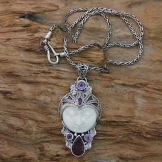 Carved Bone and Amethyst Necklace from Bali - Candra Kirana | NOVICA Amethyst Stone Necklace, Turquoise Stone Jewelry, Crown Pendant Necklace, Crown Pendant, Goddess Jewelry, Amethyst Necklace Pendant, Bone Necklace, Bone Pendant, Carved Bone