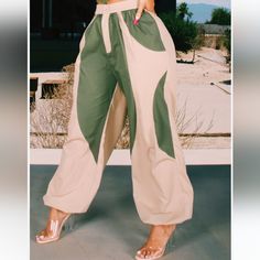 Beautiful New Pants In Olive Green And Cream In Size Xs Spring Khaki Wide-leg Parachute Pants, Green Spring Streetwear Bottoms, Trendy Khaki Summer Bottoms, Trendy Khaki Bottoms For Summer, Khaki High-waist Loose Fit Parachute Pants, High Waist Khaki Parachute Pants, Green High-waist Bottoms For Streetwear, Trendy Beige Wide Leg Pants, Khaki High Waist Loosely Fitted Parachute Pants