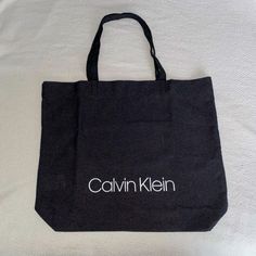 Grey Calvin Klein Tote Bag. Never Used And Machine Washable. Perfect For The Beach Or The Grocery Store! Height 15.5” Width 18” Depth 4” **Bundle For A Discount** Offers Encouraged!! :) Please Be Respectful And Remember Posh Takes 20%. Thank You Calvin Klein Casual Shoulder Bag For Daily Use, Calvin Klein Casual Bags For Everyday Use, Casual Calvin Klein Shoulder Bag For Daily Use, Casual Calvin Klein Bags For Everyday Use, Casual Calvin Klein Shoulder Bag For Shopping, Calvin Klein Casual Shoulder Bag, Calvin Klein Casual Shoulder Bag For Shopping, Casual Calvin Klein Shoulder Bag, Calvin Klein Bags For Daily Use