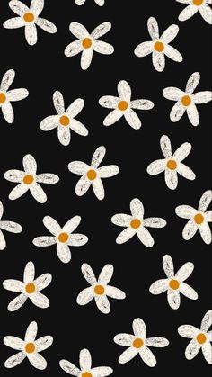 a black background with white and yellow flowers on the bottom right hand corner is an orange dot in the center