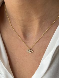 All eyes on you 👁️ Get this cute jewelry made with the high quality elements✨ You can go with 925K Sterling Silver with the options of Gold, Rose Gold or White Gold finish Beautiful jewelry for everyone 💙 ✨ Highlights ✨ * 925K Sterling Silver → 14K Gold, Rose Gold or White Gold plated * Chain length is approximately 18 inches (16+2 in extender) / 45 cm (40+5 cm extender) * Time is important! You will receive your package as soon as possible 🚚 * We care about the quality of metal to make sure Yellow Gold Jewelry With Diamond Eyes For Anniversary, Elegant Pendant Charm Necklace With Diamond Eyes, Diamond Eyes Pendant Jewelry For Anniversary, 14k Gold Evil Eye Jewelry Gift, Gold Dainty Necklace With Diamond Eyes, Gold Eye Necklace With Diamond Eyes, Dainty Gold Necklace With Diamond Eyes, 14k White Gold Jewelry With Diamond Eyes, White Gold Jewelry With Diamond Eyes In 14k Gold