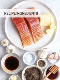 the ingredients for this recipe include salmon, cheese, and spices on a white plate