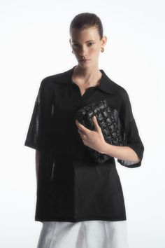 This innovative piece marries two signatures from the COS accessories collection: quilted textures and crossbody shapes. Offered in an enduring black hue, it's crafted from supple nappa leather in the signature pillowy texture and is perfectly sized to hold your phone, wallet and then some. Wear it on your shoulder, across the body or detach the strap entirely to style it as a clutch. Magnetic flap closureDetachable adjustable shoulder strapCOS supports responsible manufacturing via the Leather Working Group Shell: 100% Leather. Lining: 100% Cotton. Height: 4.72", Width: 9.44", Depth: 1.96" Women Accessories Bags, Knitwear Cardigan, Dress Trousers, Cardigan Jacket, Jean Coat, Short Tops, Dress Collection, Shirt Blouses, Top Shirt