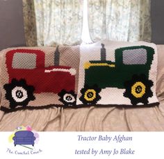 two pillows made to look like tractors on a bed with the words tractor baby afghan