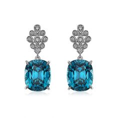 Suspended from an artful diamond floral pattern, it's easy to get swept away by these stunning, deep blue cushion cut Blue Zircon earrings. Blue Diamond Earrings For Evening, Blue Diamond-accented Evening Earrings, Luxury Blue Diamond Earrings For Formal Events, Luxury Blue Diamond Earrings For Formal Occasions, Elegant Blue Diamond Drop Earrings, Blue Diamond Drop Earrings For Formal Occasions, Luxury Blue Diamond Drop Earrings, Exquisite Blue Earrings With Diamond Accents, Blue Diamond Bridal Earrings For Formal Events