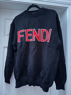 Authentic Vintage Fendi 2000s red turtle neck sweater top lour: red Year: 2000s Made in Italy Material : 100% fleece wool  Condition rating:    N  (check our vintage rating scale in the photos)  Measurements below size: L Chest: 110cm  (full circle) length: 68cm P.s   1) What you see here is what you going to received!!  2) All vintage sales are final.  Message us or email us anytime you needed help. Designer Crew Neck Winter Sweater, Designer Crew Neck Sweater For Winter, Casual Black Wool Sweatshirt, Designer Long Sleeve Winter Sweatshirt, Designer Crew Neck Sweater For Streetwear, Designer Crew Neck Tops For Fall, Trendy Wool Sweater With Crew Neck, Trendy Wool Crew Neck Sweater, Designer Black Top For Winter