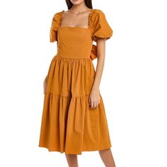 Kathleen Maeve Grace Midi Dress Color: Pumpkin Spice Approx 45in From Shoulder To Hem It’s A Straight Neckline, Puffed Elasticized Sleeves, Self-Tie Sash At Waist, And Tiered Skirt. 96%Poly 4%Spand Brown Puff Sleeve Midi Dress For Brunch, Spring Orange Cotton Midi Dress, Orange Puff Sleeve Dress For Brunch, Orange Square Neck Spring Dress, Orange Square Neck Dress For Spring, Chic Orange Square Neck Midi Dress, Fitted Orange Cotton Midi Dress, Orange Square Neck Midi Dress For Brunch, Orange Ruffled Midi Dress For Brunch