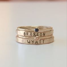 Mother's Day Gift | Gold Name Rings | Personalized Rose Rings with Names | Birthstone Rings | Ring Set | Gift for Mom two kids | Stackable rings This set includes four rings!  You will receive two name rings in 14K gold filled with two 14K  gold filled birthstone rings.   These rings are handmade in our Indiana studio. Each engraved ring starts from a spool of wire. They are handcut, handformed and soldered in the first process of creating your ring. They are then hammered to size, engraved, han Rings With Names, Name Rings Personalized, Mama Ring, Mother Ring, Mothers Jewelry, Rose Rings, Memorial Ring, Birthstone Rings, Mom Ring