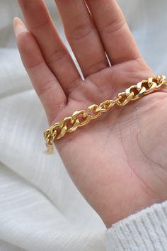 This bracelet is a clean and edgy gold look. The gold finish wraps around your wrist making the bracelet lightweight. Diameter: 6.2 + 2.00 Inches Material: Alloy The Gold, Wrap Around, Gold Finish, Bracelet, Gold