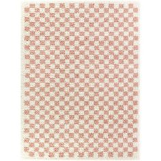 an orange and white checkered area rug