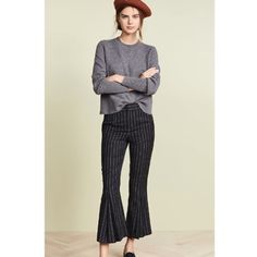 Frame Pleated Crop Pants Color: Noir Multi Fabric: Wool Suiting Pleated Pinstripe Pattern Flare Silhouette Cropped Profile Hook-And-Eye At Waist Zip At Fly On-Seam Side Pockets Welt Back Pockets Shell: 70% Wool/30% Polyester Dry Clean Imported Size 2 New With Tags Fitted Pants With Vertical Stripes For Fall, Chic Vertical Stripes Pants For Fall, Fall Striped High-waisted Pants, Pinstripe Bottoms For Workwear In Fall, Fall Pinstripe Bottoms For Workwear, Striped Trousers For Fall, Spring Workwear Bottoms With Striped Hem, Vertical Stripes Bottoms For Workwear In Fall, Fall Workwear Bottoms With Vertical Stripes