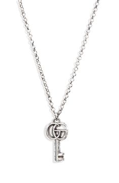 The emblematic double-G tops a key pendant with a flowing arabesque design on this bold chain-link necklace. Style Name:Gucci Gg Silver Key Necklace. Style Number: 6134022. Engraved Silver Gucci Necklace, Luxury Engraved Gucci Necklaces, Luxury Silver Chain Necklace With Logo Charm, Luxury Gucci Silver Chain Jewelry, Gucci Sterling Silver Chain Jewelry, Gucci Silver Chain Jewelry As A Gift, Elegant Sterling Silver Key Necklace, Luxury Chain Link Necklaces With Logo Charm, Luxury Pendant Chain Necklace With Logo Charm