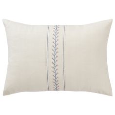 a white pillow with blue stitching on it